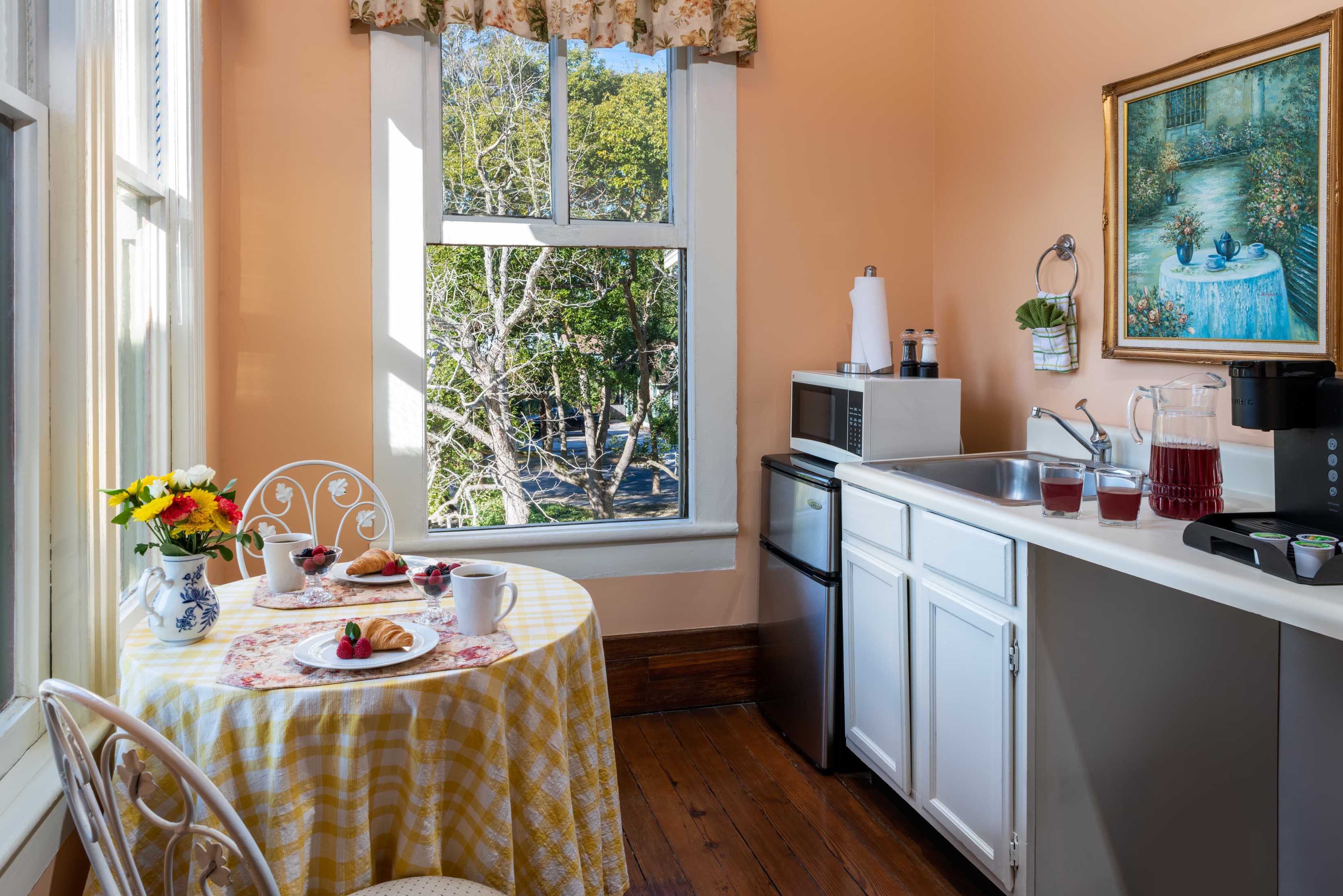 Cozy kitchenette and breakfast nook with garden views